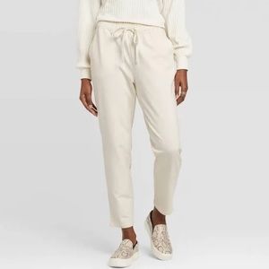 NWT a. new day, cream four-way stretch, joggers. Small